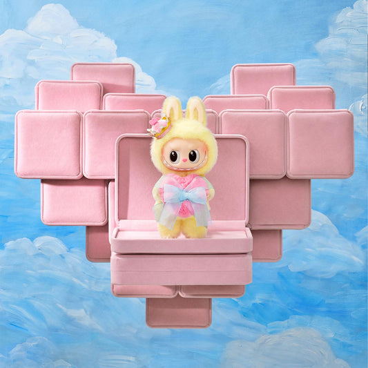 THE MONSTERS Let's Checkmate Series LABUBU standing in front of pink boxes shaped in a heart (labubu popmart)